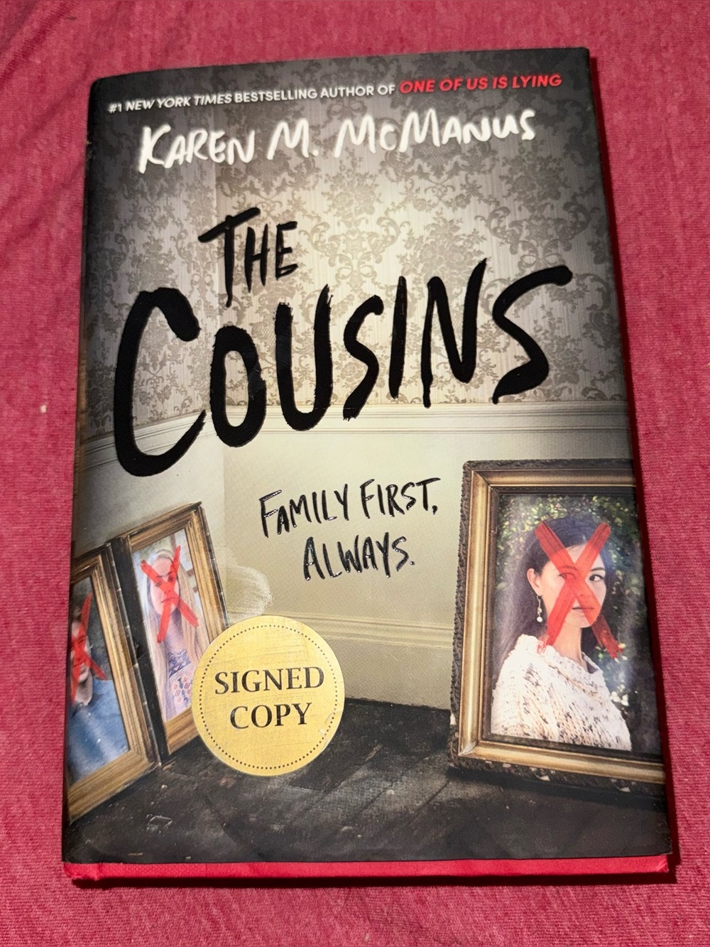 Source Unknown - The Cousins Hardcover (black, gray, red)